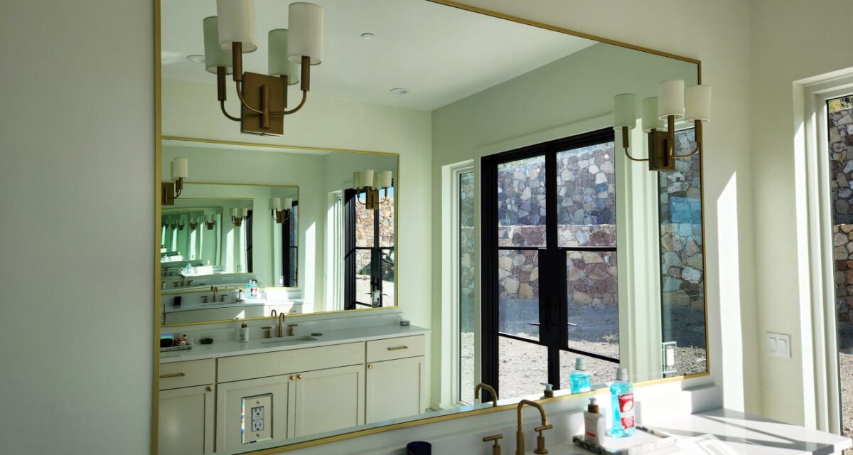 Custom LED-backlit mirror fabrication and installation for a Bangalore home