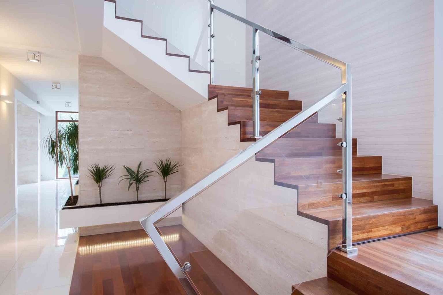 Laminated toughened glass balcony railing on SS316 spigots in Bengaluru apartment