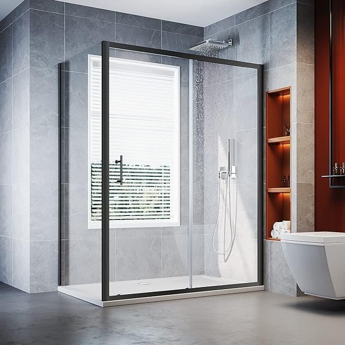 Frameless shower glass partition enclosure fitted in a Bengaluru bathroom